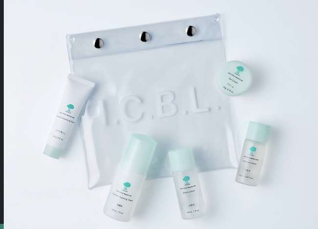 Dr. Ishii — full I.C.B.L. travel set with cleansing oil, foaming wash, basic lotion, essence lotion, and gel cream in branded clear pouch