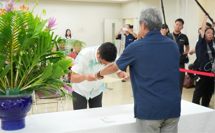 The governor-elect receiving his certificate of election
